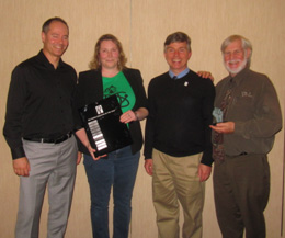 Left to right – Carl Cahoon, Chair of Awards Committee; Karen Hall, Executive of the Year; Robert MacDonald, Regional Director; Don Burns Former Vice-President.  